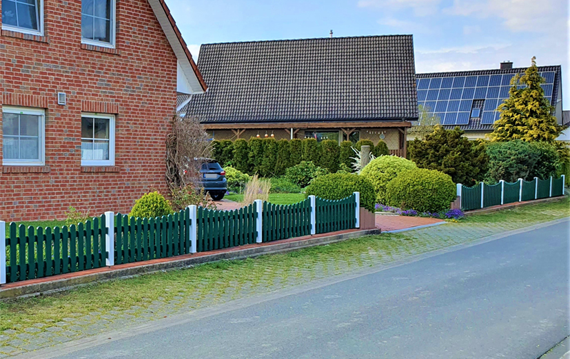 Grün-Weißer Schwung am Vorgarten